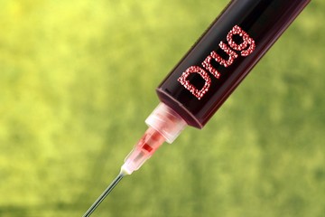 Drug addiction syringe concept