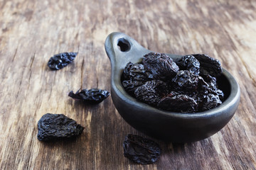 dried prunes in a bowl
