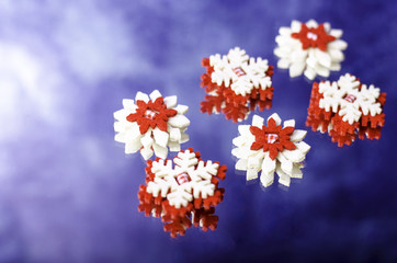 Red with white snowflakes.