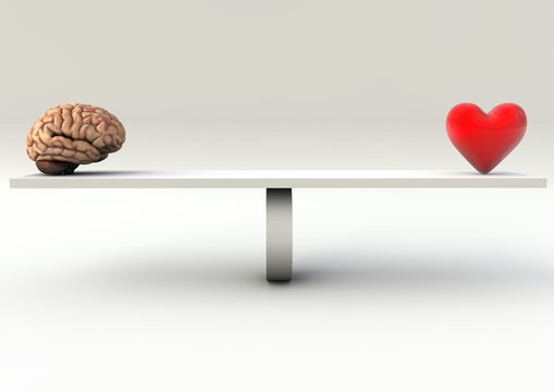 Balance Concept of an brain and an heart on a Seesaw