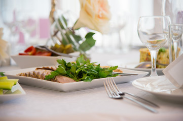 Dish of food. Cold snacks. Serving of food. Table decorations. Menu for a person. Food for anniversaries, weddings and celebrations.