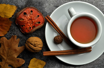 fresh tea with autumn decorations