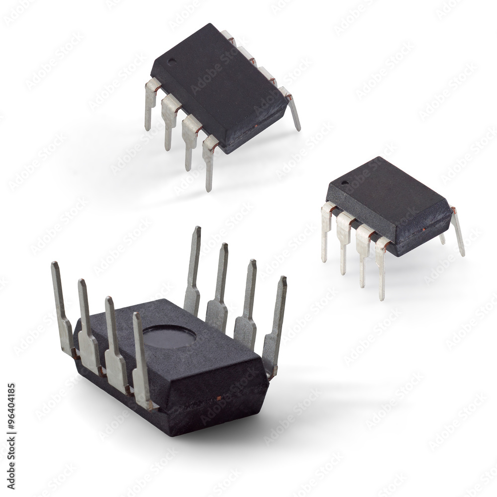 Wall mural two-side macro photos of an microcontroller chip in a dip8 package isolated on a white background.