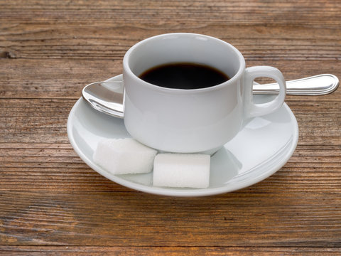 Strong black coffee with sugar, espresso style