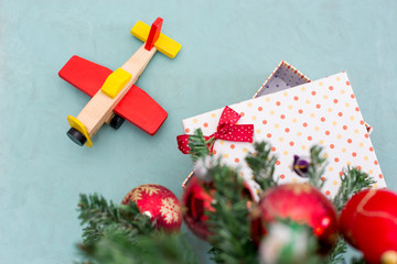 Christmas tree with gifts on blue background.