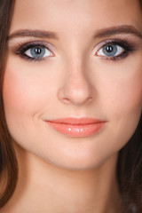 Fototapeta premium Portrait of an attractive fashionable young brunette woman