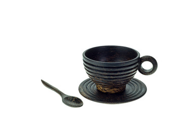 Brown wooden coffee cup made from palm wood isolated on white ba