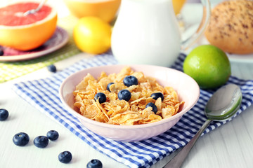 Healthy breakfast with fruits and berries on table close up