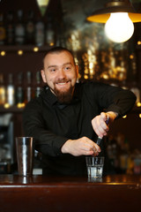 Bartender making cocktail