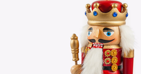 Traditional figurine christmas nutcracker wearing an old military style uniform