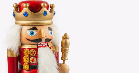 Traditional figurine christmas nutcracker wearing an old military style uniform