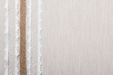 Lace frame on linen cloth background