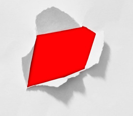 Hole and ripped in paper background
