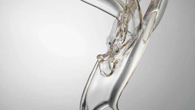 Pouring oil and making splashes. Shot with high speed camera, phantom flex 4K. Slow Motion.