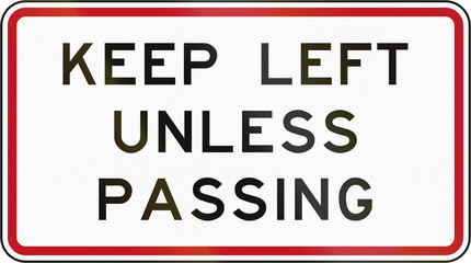 New Zealand road sign RG-22 - Keep left unless passing (overtaking)