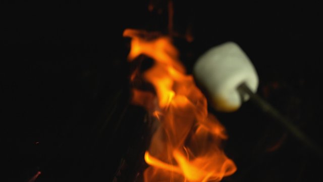 Roasting marshmallow. Shot with high speed camera, phantom flex 4K. Slow Motion. 