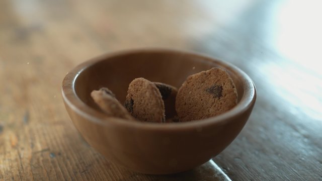 Cookies in bowl. Shot with high speed camera, phantom flex 4K. Slow Motion. 