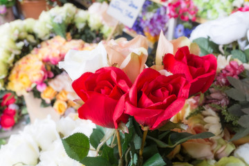 Colourful artificial flower made from plastic and fabric.