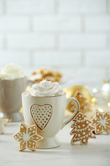Beautiful composition with cups of cappuccino and Christmas cookies