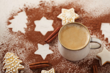 Beautiful composition with cup of cappuccino and Christmas cookies