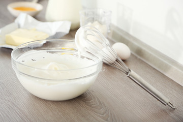 Cooking buttery cream on kitchen