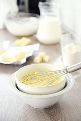 Cooking buttery cream on kitchen