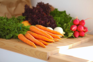 Vegetables on the desk in a kitchen