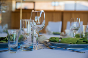 gift and cloth lay on a plate with cutlery