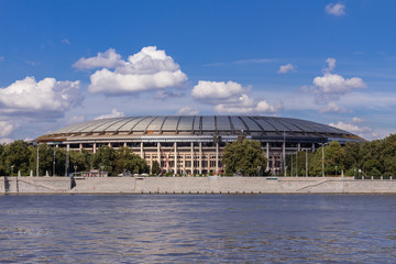 Fototapeta na wymiar The Luzhniki Stadium on the bank of the river