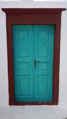 door in small greece village exo gonia on santorini