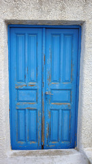 Obraz na płótnie Canvas door in small greece village exo gonia on santorini