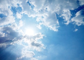 The sun on cloudy sky