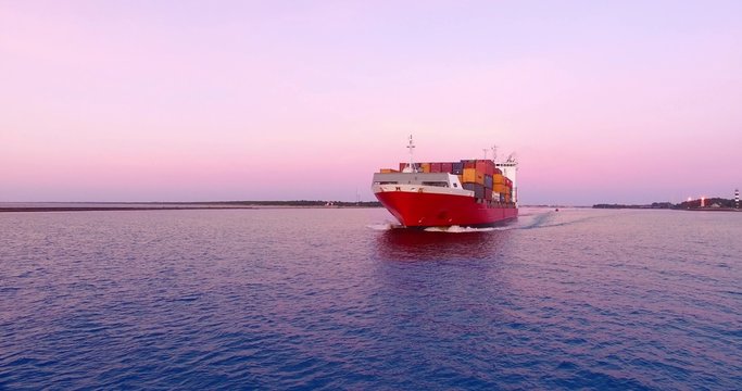 4K - in front of cargo ship