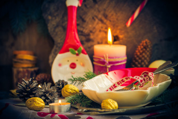 Festively decorated Christmas table tableware candles mood