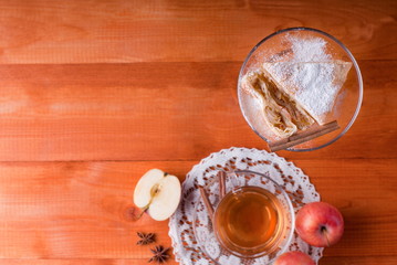 piece of apple pie on the table, top view