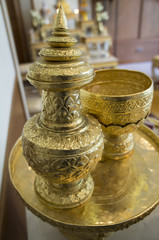 Fototapeta na wymiar goldware antique container craft gold household utensil concept