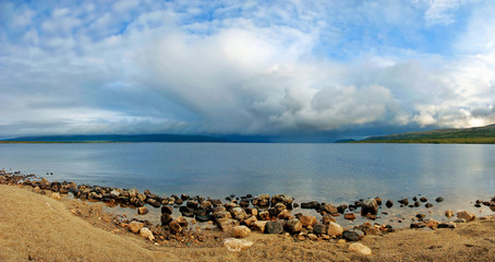 Panorama of the lake with beautiful clouds