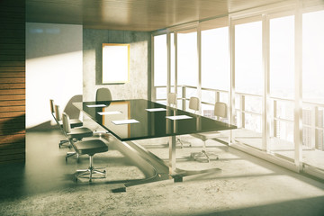 Modern loft style conference room with furniture at sunrise
