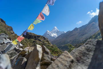 Ama Dablam with stack stone and prayer flag