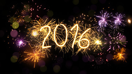 new year 2016 sparkler sign and firework