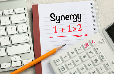 concept of synergy with calculator 