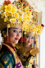 Balinese dancers / Balinese Legong dancers sitting at the window