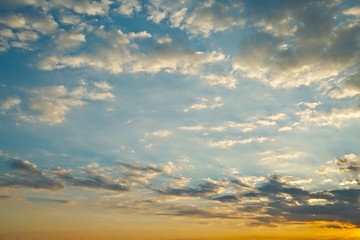 Fototapeta na wymiar Sunset clouds and light rays