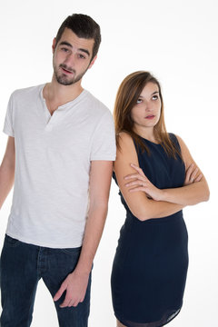 Closeup portrait of two people or couple back to back thinking deeply about something