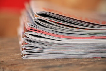 Magazines on the wooden table