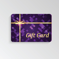 Gift card with abstract pattern and gold ribbon