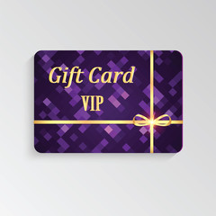Gift card with abstract pattern and gold ribbon