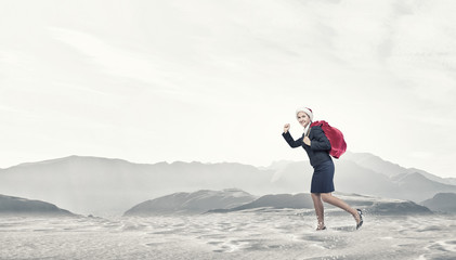 Businesswoman in Santa hat