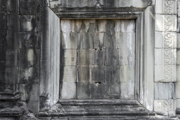 window frame on stone wall of Angkor wat temple, world heritage,