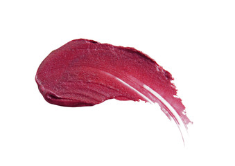 Smudged lipstick on white background